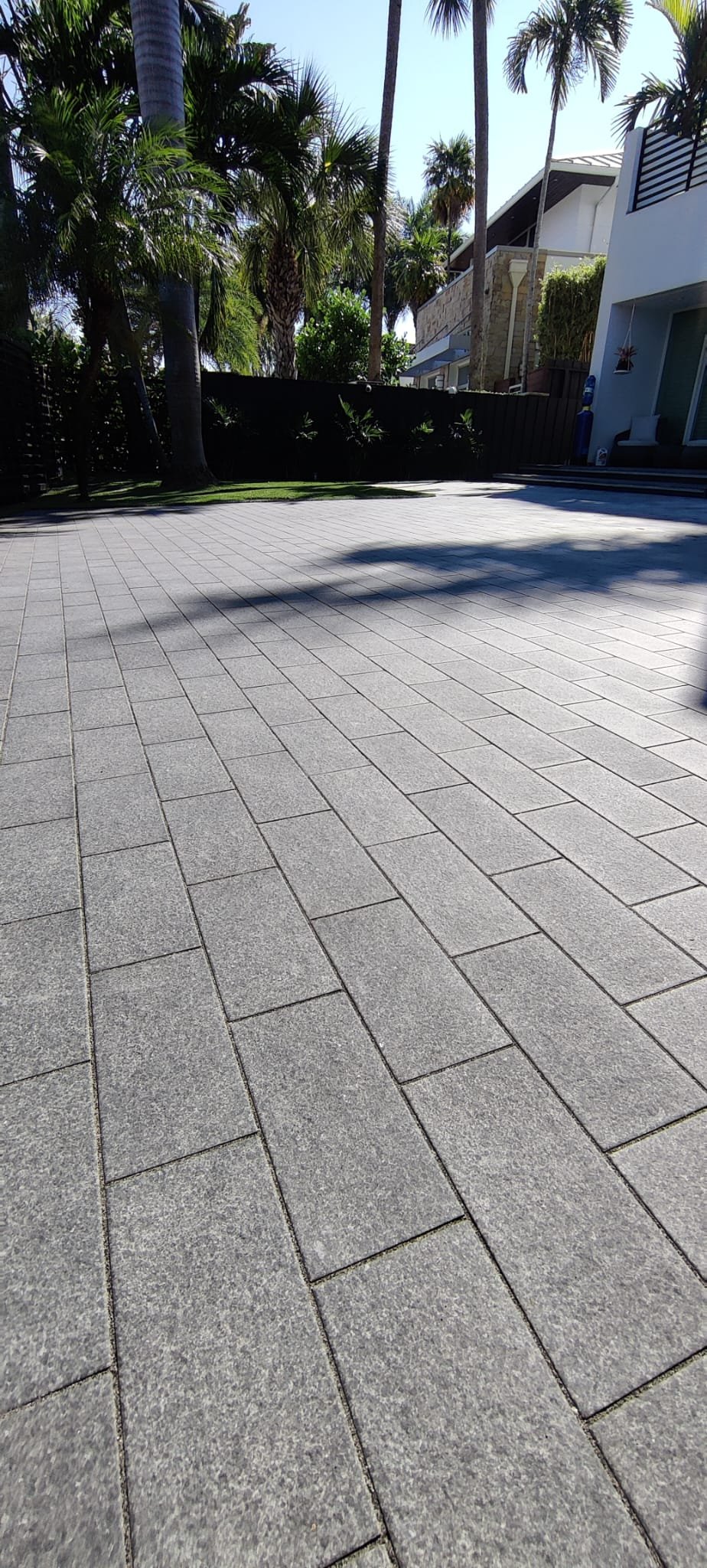 Driveway paver cleaning result South Florida